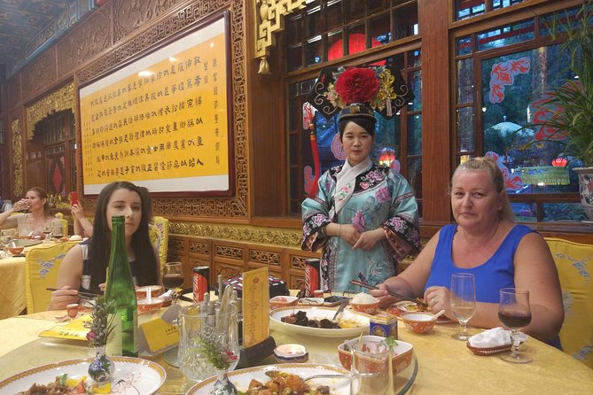Beijing Imperial Dining Experience at Bai Jia Da Yuan Restaurant with Houhai Lake Bar Tour - The Night Drive: Bird’s Nest, Water Cube, and Beijing’s Clock Towers
