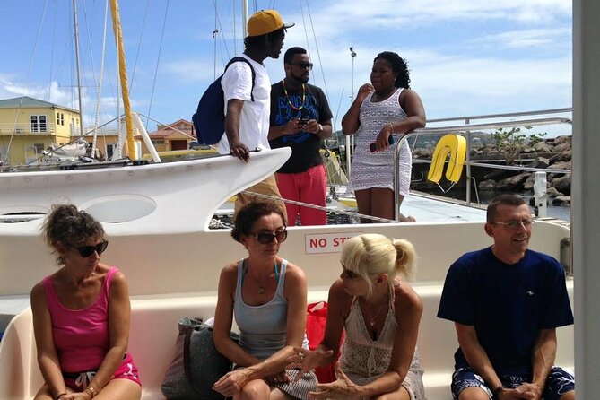 Catamaran Sunset and Cocktail Cruise - The deck experience: cocktails, appetizers, music, and crew-led fun