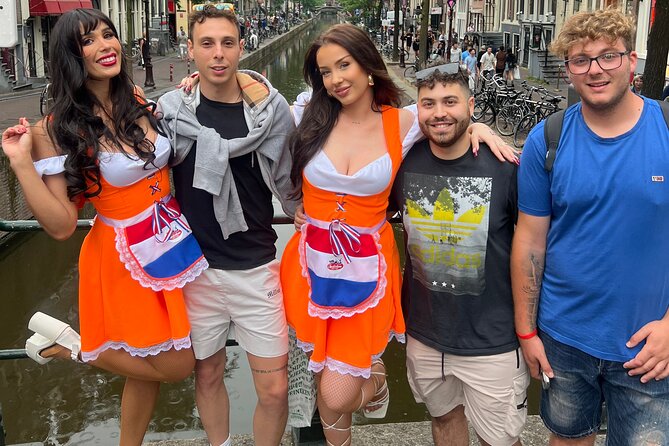 Private Hostess Bar Tour in Amsterdam Red Light District (3h) - De Wallen crawl: four bars, free shots, and hostess-led entertainment